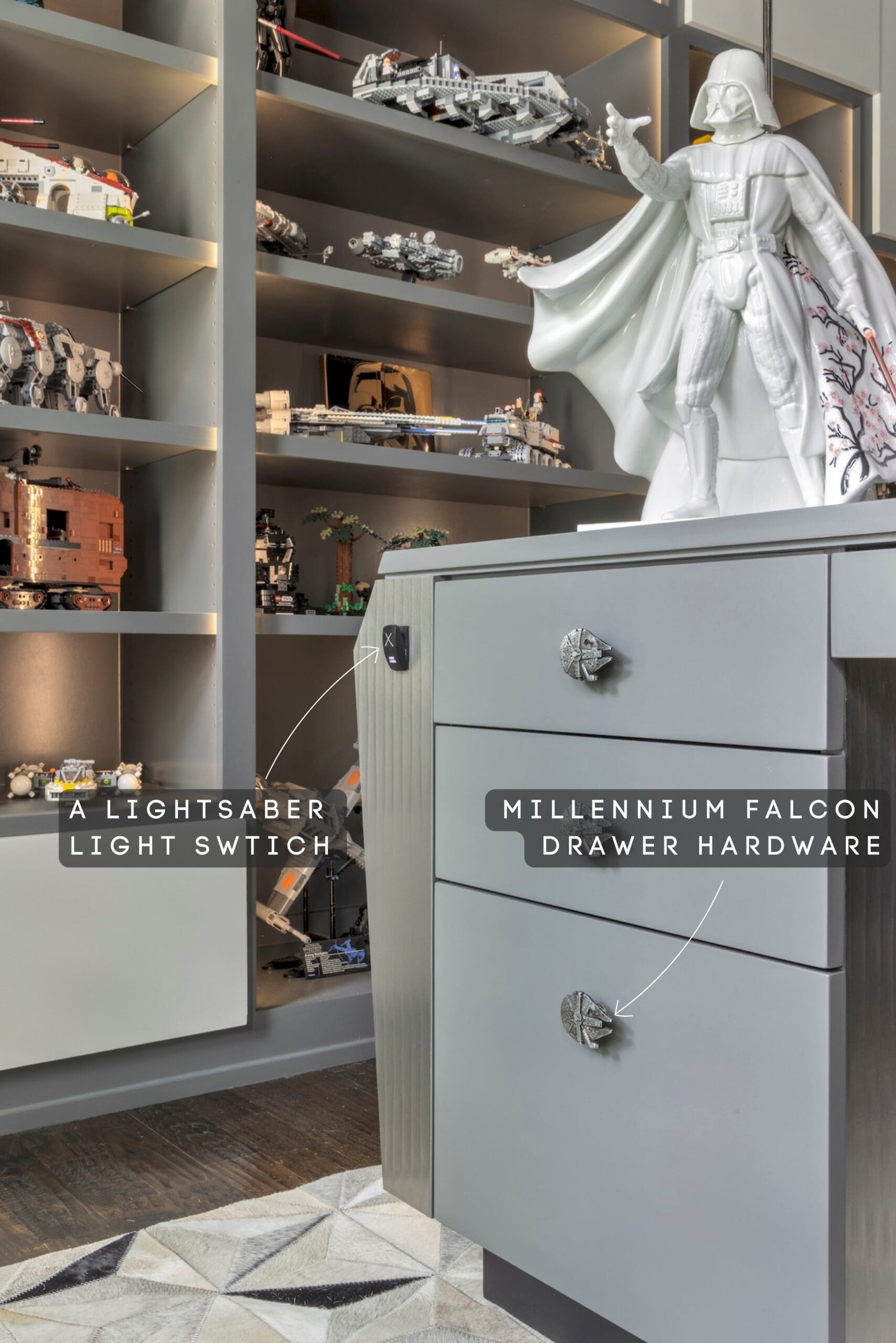 Custom drawer hardware and a geometric cowhide rug in a high-end home office design.