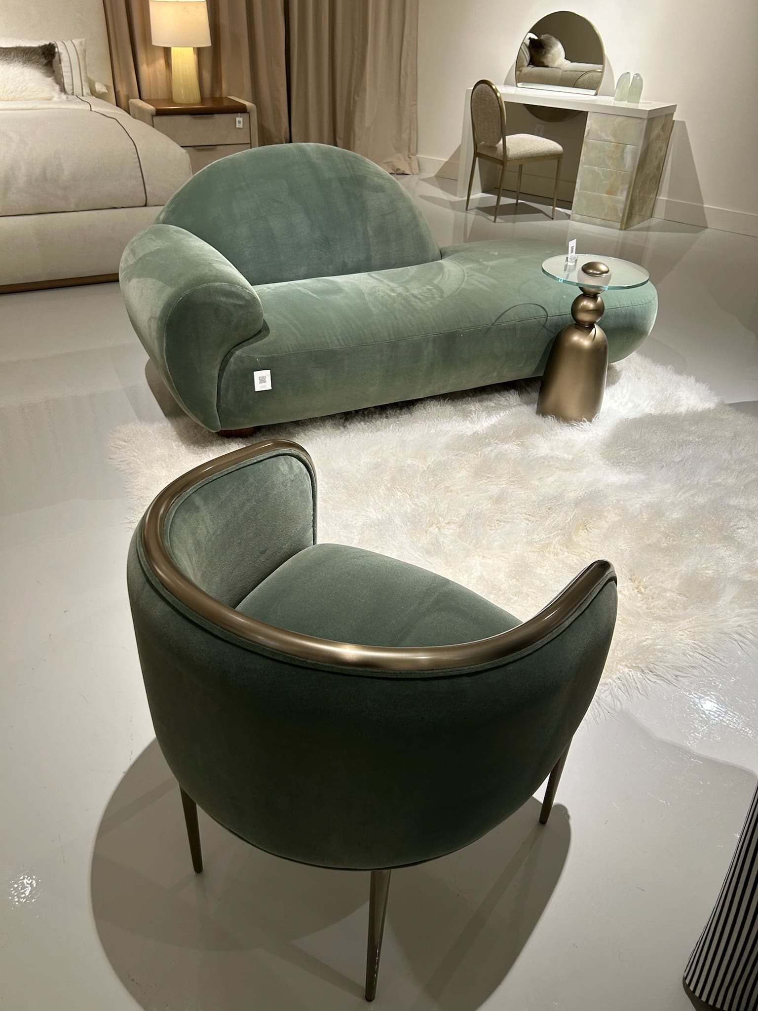 Moody forest green velvet chairs High Point Market 2026 Baker Design Group Dallas luxury interior design trends